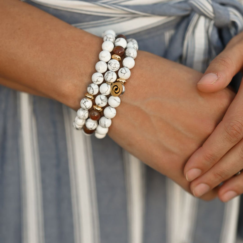 woman wearing the positive thinking crystal bracelet 