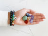 wearing the 7 chakra bracelet and holding crystals in hand