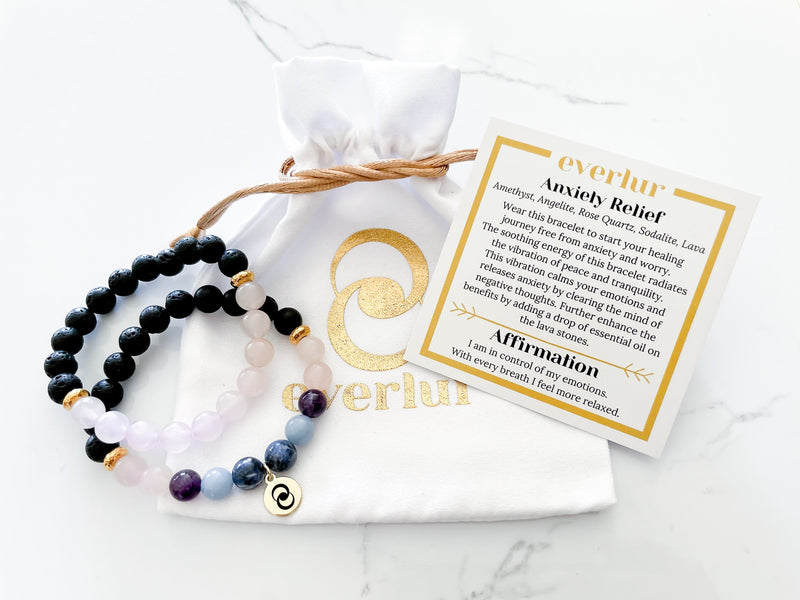 anti anxiety bracelet stack with everlur's white velvet pouch and bracelet card