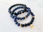 three piece believe bracelet with a lapis lazuli and onyx stack to create a bold fashion accessory for motivation and empowerment. This affirmation charm is a daily reminder to believe in yourself and never give up on your dreams
