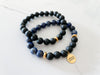 side view of a two piece believe bracelet with lapis lazuli and a black onyx stack. Inspirational bracelets to believe in yourself and your dreams 